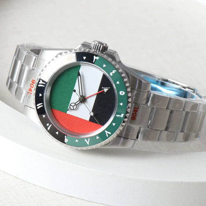 NH34 GMT watch with a UAE flag dial, green-black bezel, and stainless steel bracelet. Features automatic mechanical movement and sapphire crystal.